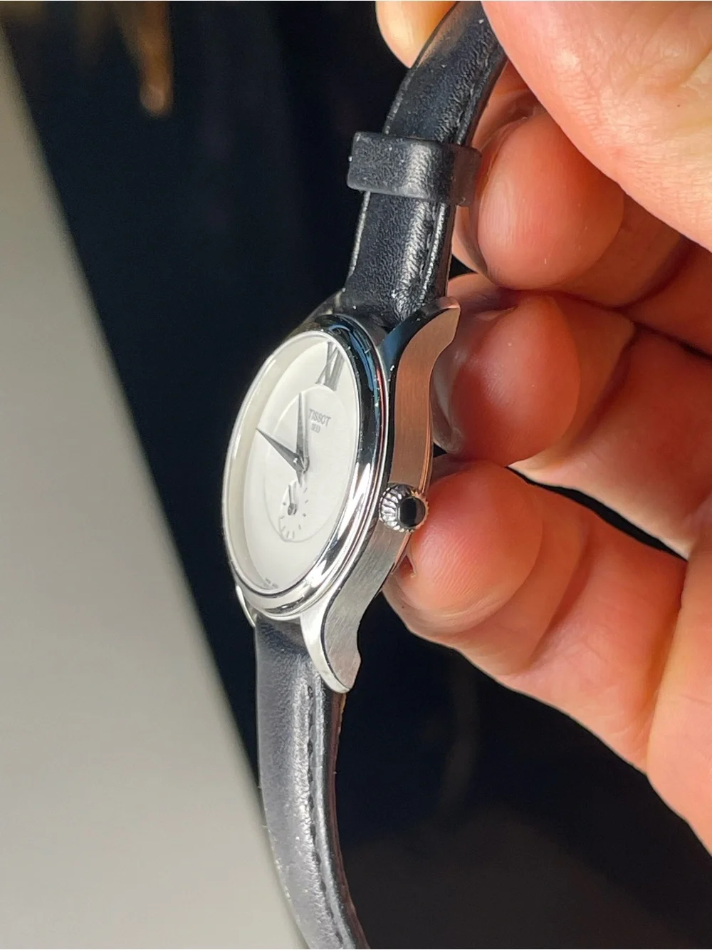Tissot Bella Ora Ladies Black Leather Strap Silver Case White Dial Watch